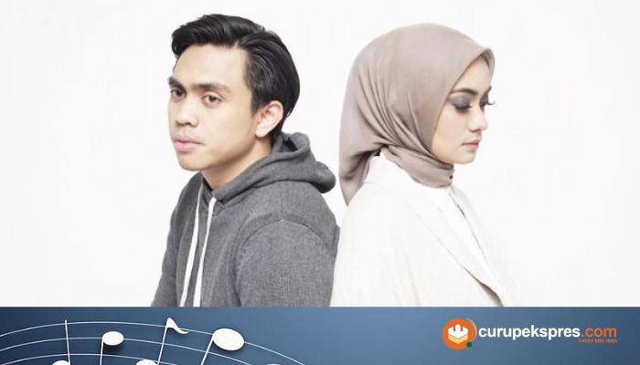 Lirik Lagu 'Teman Tapi Menikah' Dengarkan Dia